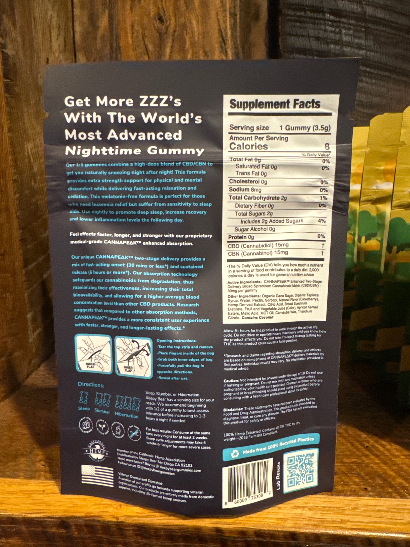 Back of a nighttime gummy supplement package displaying product information and supplement facts.